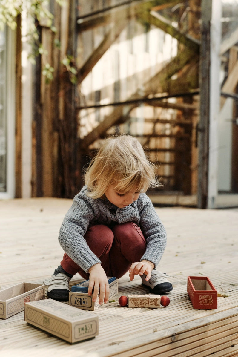 Drehe den Block - Commedia dell'arte-rot